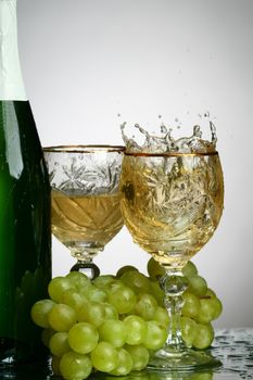 champagne splash grape and green bottle