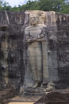 The colossal (7-metre tall) Standing Buddha was carved out of a granite cliff at Gal Vihariya in Pollanaruwa in Sri Lanka. It is part of one of the most important Buddhist shrines in the world and also part of a UNESCO World Heritage Site.
