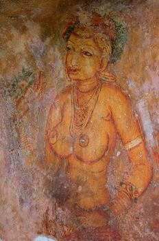 A Sigiriya maiden: one of the 5th century frescoes at the ancient rock fortress of Sigiriya, a UNESCO World Heritage Site in Sri Lanka.