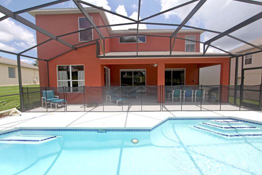 A Back Exterior in Florida with Swimming Pool and Lanai