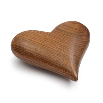 Photo of a carved wooden heart, isolated on a white background.
