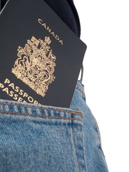 A passport in a back pocket of someone wearing jeans, shot from behind, with back pocket visible, isolated on white.