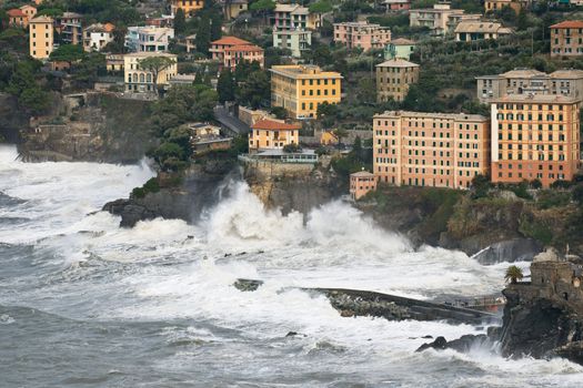 Sea storm in camogli, small town near Genova, italy