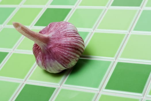 Head of the garlic for green ceramic tiled bar