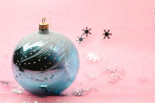 christmas card ball on pink background