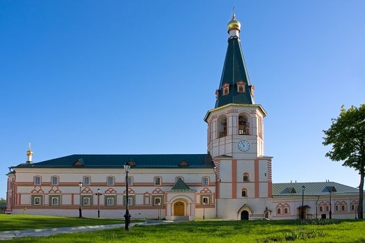 Bell tower against the sky in Iversky Monastery, Russia.