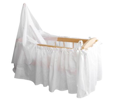 Wooden Bassinet with White Drapes isolated with clipping path      