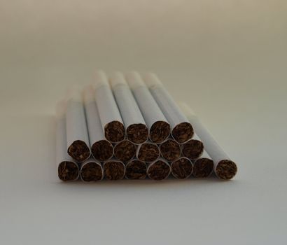 Pile of white tobaco cigarettes