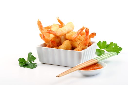 Oriental shrimp rolls and coconut shrimp with spicy orange dipping sauce.