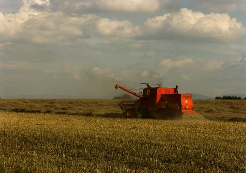 Combine performing his job