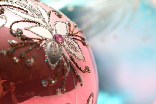 christmas card ball on pink background