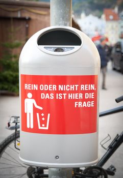 Dustbin in the City with German Phrase