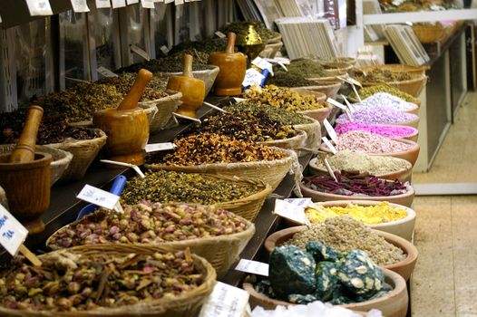 Shop in an oriental Arab market bazzar with variety of colorful herbs and spices