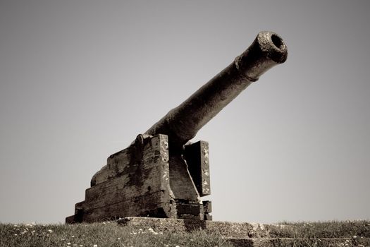 Old, rusty cannon. Tenby, Wales.