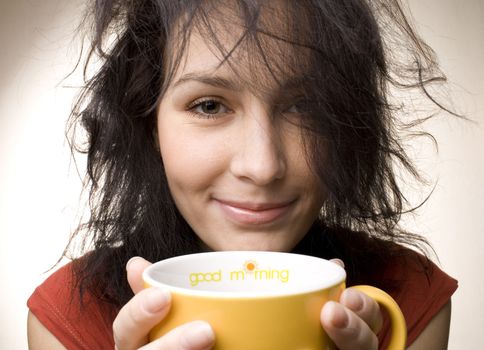 positive girl with yellow cup titled "Good morning"