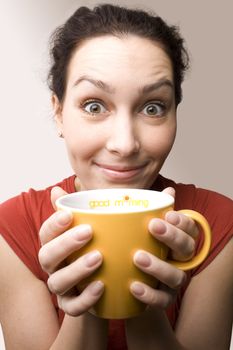 positive girl with yellow cup titled "Good morning"