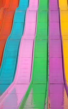 Multi colored metal carnival slide background
