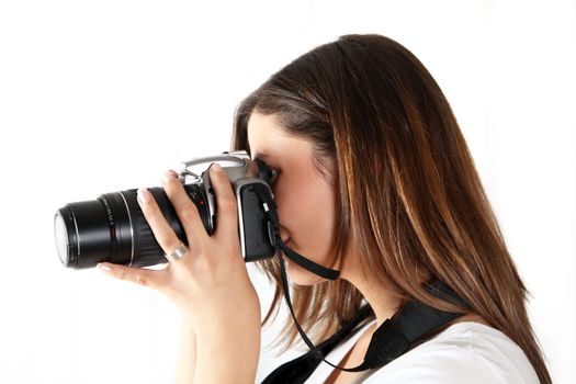 A young photographer shot to the left - in front of white background

