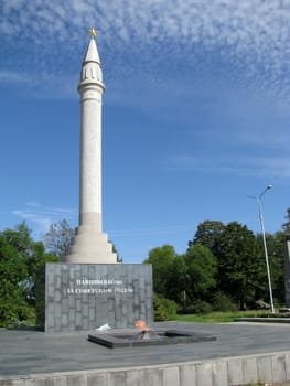 Monument; eternal flame; laid; architectral building; styles; park