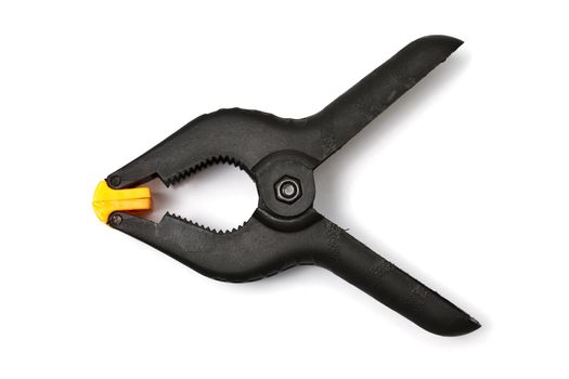 Black spring clamp isolated on white background