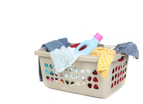 Basket Full of Dirty Laundry With Detergent Ready to Be Washed