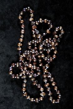 NECKLACE FROM river pearls on a black velvet