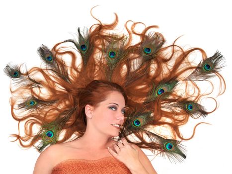 Autumn Fairy Concept - Redhead With Peacock Feathers in Her Hair on White Background