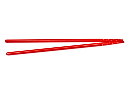Red chopsticks isolated on white background 
