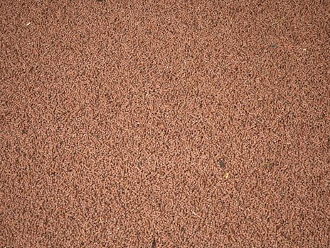 Background of food pellets used at a dairy to feed the cows