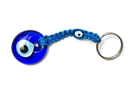 Blue " cat eye" keychain isolated on white background