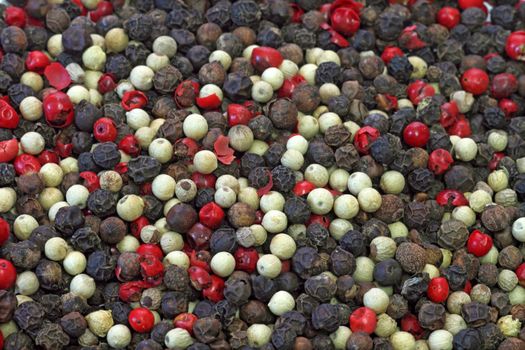 Pile of mixed pepper in detail. Shot in studio.