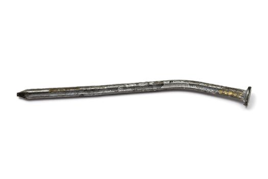 Rusty bent nail isolated on white background