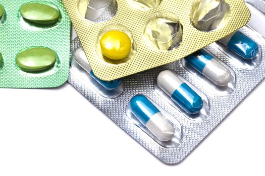 Different pills isolated on white background