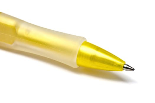 Yellow pen closeup on the white background 

