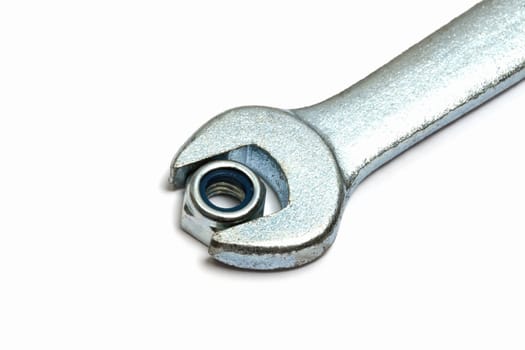 A Wrench closeup isolated on white background

