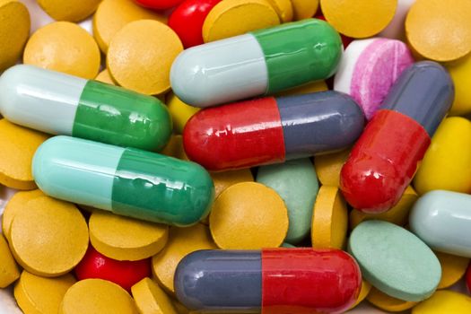 Colorful pills closeup. Background of multi pills