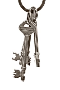 A bunch of old keys isolated on white background 
