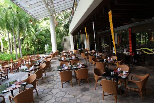 Outdoor seating area in a modern restaurant.