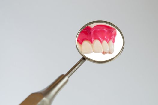 Teeth in the dentist's mirror