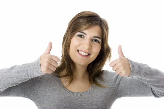 Portrait of an attractive young woman with thumbs up. - Isolated on white
