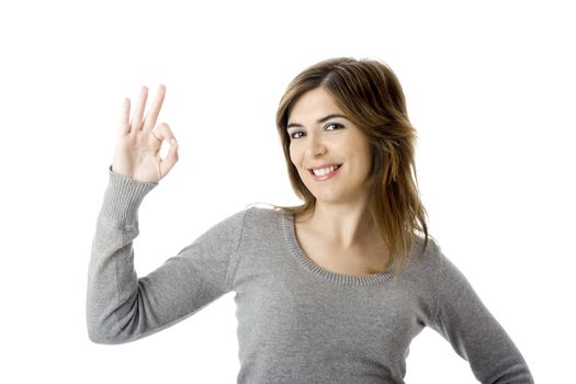 Young businesswoman indicating ok sign. Isolated over white background