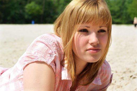 Portrait of a teenage girl on the beach.