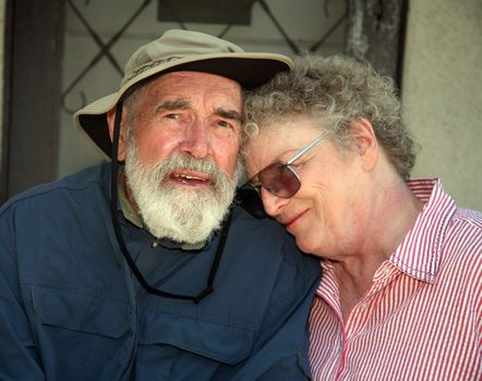 Elderly couple sitting on a porch