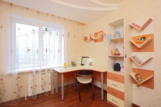 Children's room with toys a desk