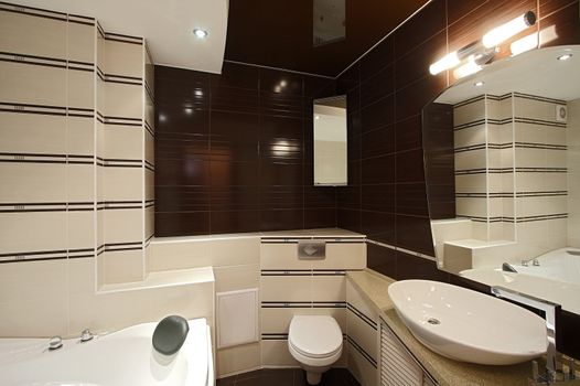 The beautiful modern bathroom finished with a tile