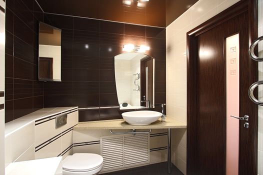 The beautiful modern bathroom finished with a tile