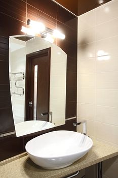 The beautiful modern bathroom finished with a tile