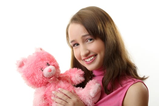 The girl with a pink teddy bear