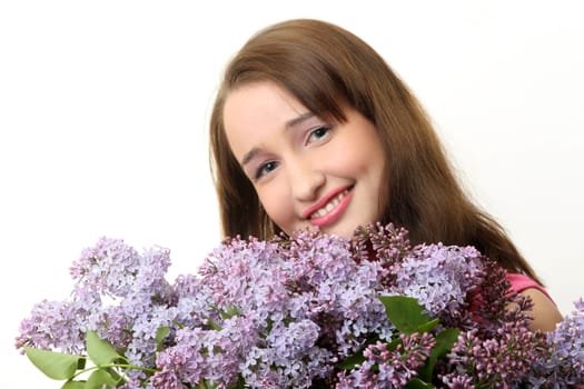 The young Girl with a lilac bouquet