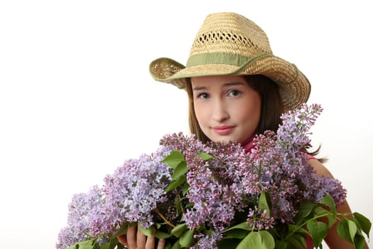 The young Girl with a lilac bouquet